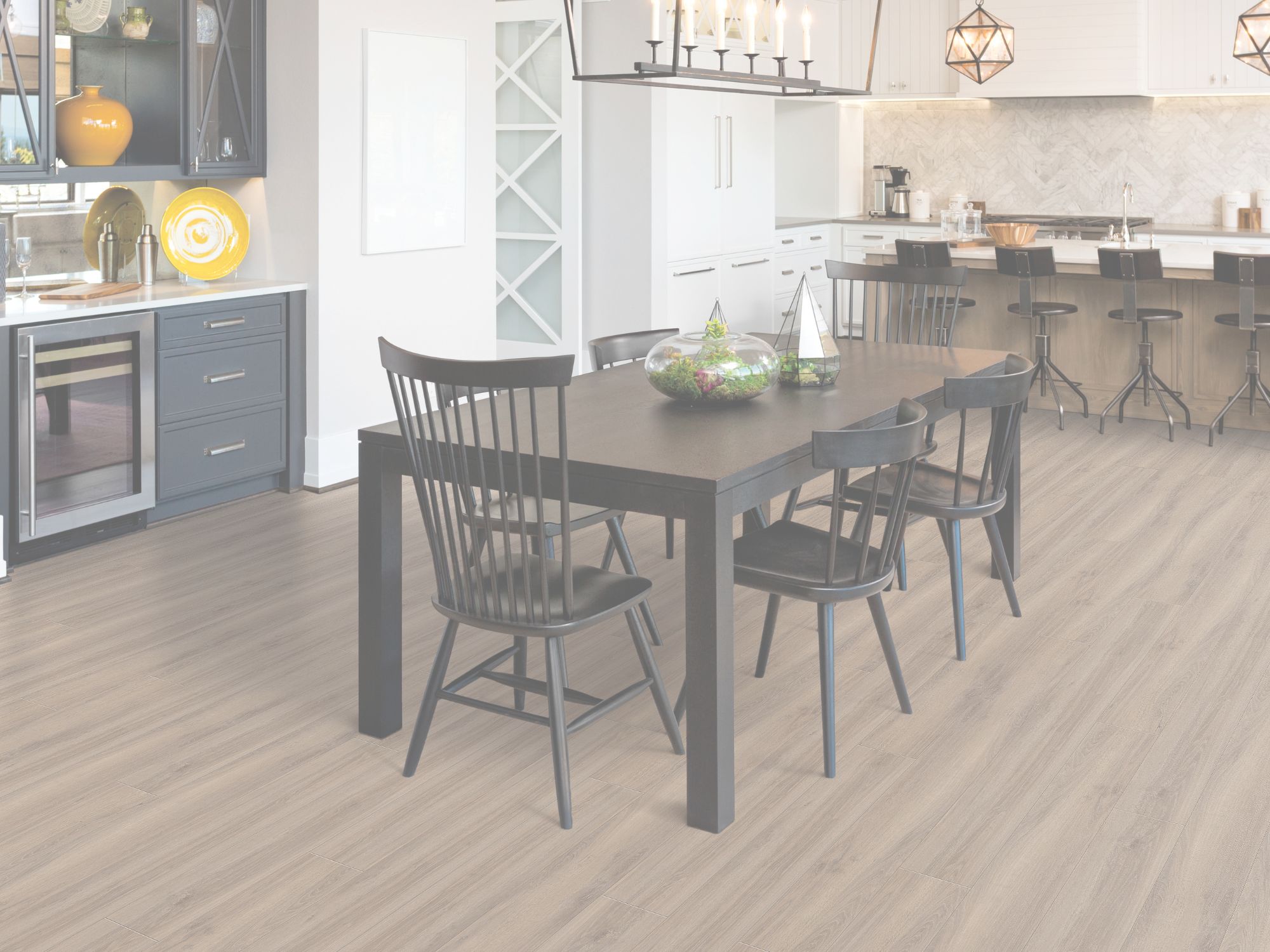 luxury vinyl plank flooring in a modern Loves Park kitchen from The Floor Trader